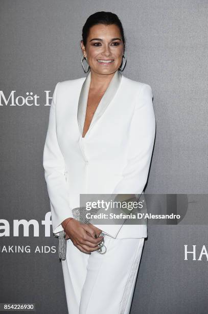 Alena Seredova walks the red carpet of amfAR Gala Milano on September 21, 2017 in Milan, Italy.