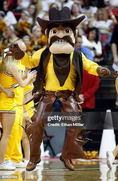 Wyoming Cowboys mascot "Pistol Pete" jumps in the air during a semifinal game against the Utah Utes during a semifinal game of the Conoco Mountain...