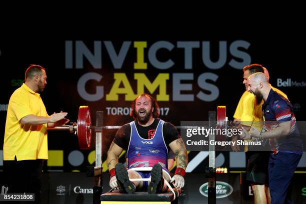 Martin Tye of the United Kingdom celebrates after competing to win the gold medal in the Men's Powerlifting Heavyweight Final during the Invictus...