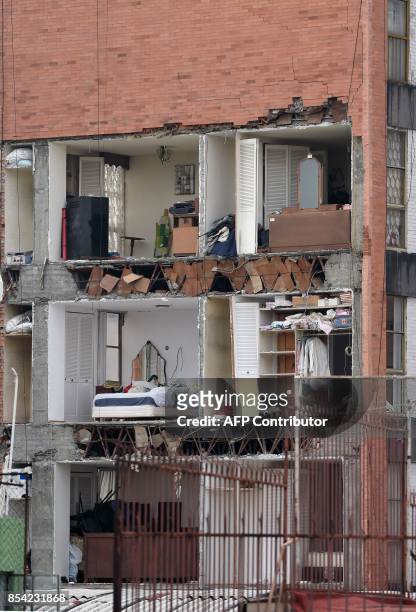 Picture of a building damaged by the magnitude 7.1 quake that struck central Mexico a week ago, in Mexico City taken on September 26, 2017. A week...