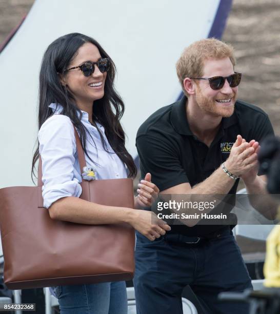 Meghan Markle and Prince Harry attend wheelchair tennis on day 3 of the Invictus Games Toronto 2017 on September 25, 2017 in Toronto, Canada. The...