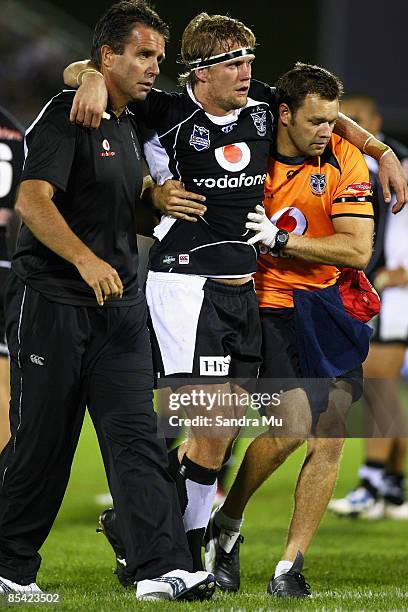 Micheal Luck of the Warriors is carried from the field after being knocked out during the round one NRL match between the Warriors and the Parramatta...