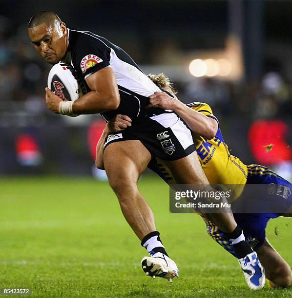 Jerome Ropati of the Warriors is tackled during the round one NRL match between the Warriors and the Parramatta Eels at Mt Smart Stadium on March 14,...