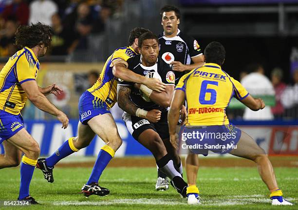 Manu Vatuvei of the Warriors is tackled during the round one NRL match between the Warriors and the Parramatta Eels at Mt Smart Stadium on March 14,...