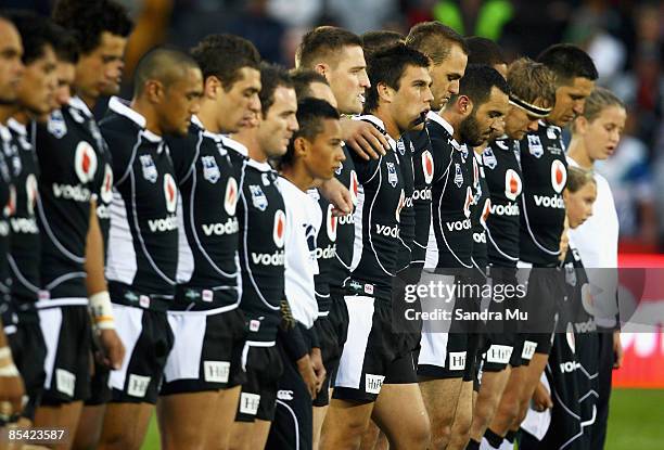 The Warriors stand for a minutes silence in remembrance of Sonny Fai before the round one NRL match between the Warriors and the Parramatta Eels at...