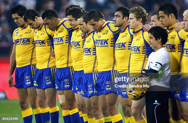 The Eels stand for a minutes silence in remembrance of Sonny Fai before the round one NRL match between the Warriors and the Parramatta Eels at Mt...