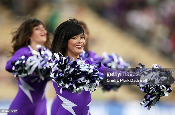 Storm cheer leaders perform before the round one NRL match between the Melbourne Storm and the St George Illawarra Dragons at Olympic Park on March...