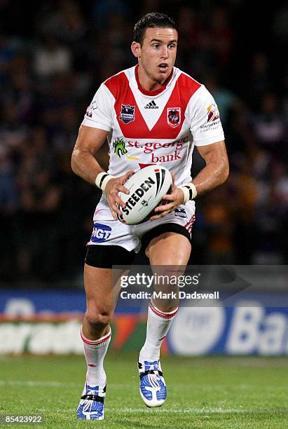 Darius Boyd of the Dragons runs the ball during the round one NRL match between the Melbourne Storm and the St George Illawarra Dragons at Olympic...