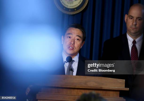 Joon Kim, acting U.S. Attorney for the Southern District of New York, speaks during a news conference in New York, U.S., on Tuesday, Sept. 26, 2017....