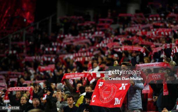 Spartak Moskva fans hold up scarfs prior to the UEFA Champions League group E match between Spartak Moskva and Liverpool FC at Otkrytije Arena on...