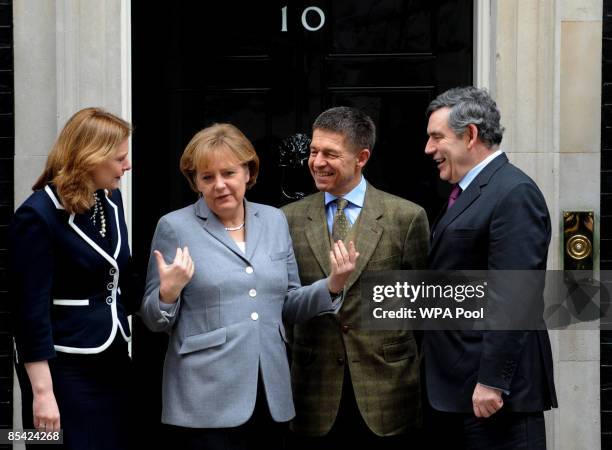 British Prime Minister Gordon Brown and his wife Sarah Brown stand outside number 10 Downing Street with German Chancellor Angela Merkel and her...