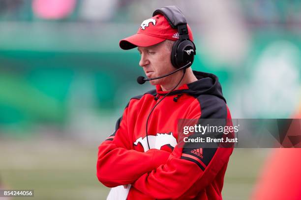 Head coach Dave Dickenson of the Calgary Stampeders on the sideline during the game between the Calgary Stampeders and Saskatchewan Roughriders at...