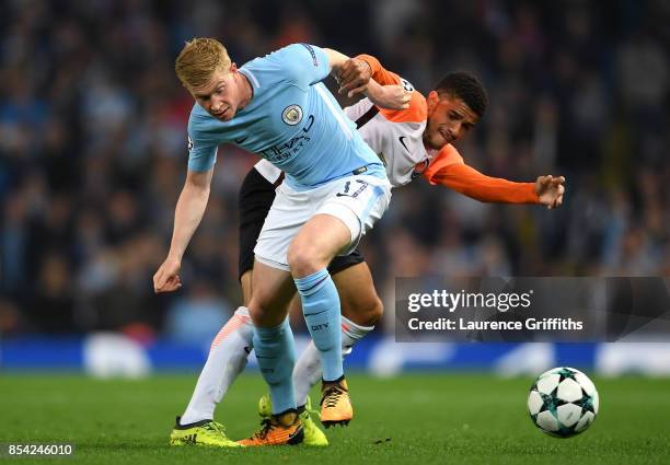 Kevin De Bruyne of Manchester City and Taison of Shakhtar Donetsk battle for possession during the UEFA Champions League Group F match between...