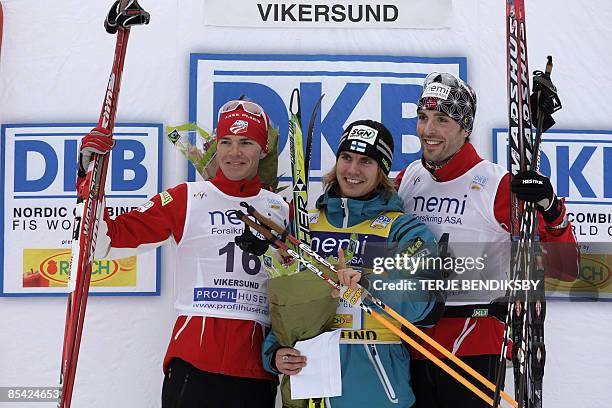 Bill Demong , Finland's Annsi Koivuranta and Norway's Magnus Moan celebrate after the Men's FIS World Cup Nordic Combined event in Vikersund, on...