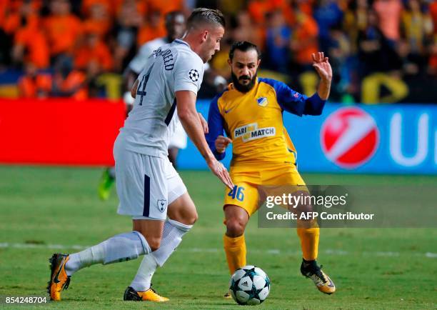 Tottenham Hotspur's Belgian defender Toby Alderweireld vies for the ball with Apoel FC's Cypriot midfielder Efstathios Aloneftis during the UEFA...