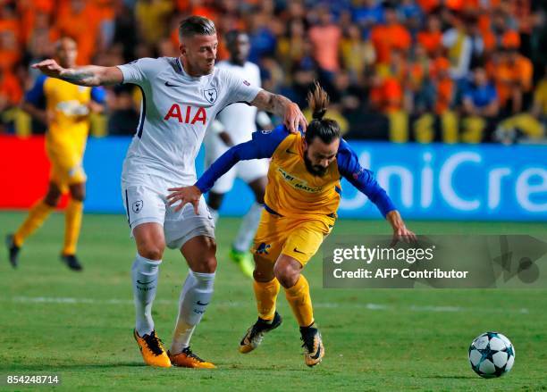 Tottenham Hotspur's Belgian defender Toby Alderweireld vies for the ball with Apoel FC's Cypriot midfielder Efstathios Aloneftis during the UEFA...