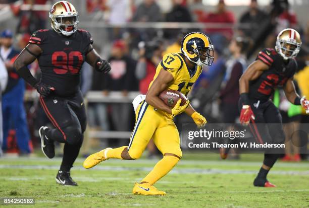 Robert Woods of the Los Angeles Rams runs with the ball after catching a pass against the San Francisco 49ers during their NFL football game at...