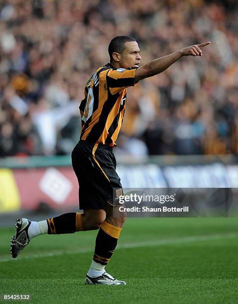 Geovanni of Hull City celebrates after scoring during the Barclays Premier League match between Hull City and Newcastle United at the KC Stadium on...