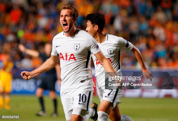 Tottenham Hotspur's English striker Harry Kane celebrates after scoring during the UEFA Champions League football match between Apoel FC and...