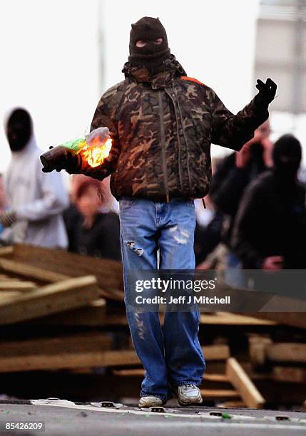 Masked Nationalist youth protests in the home town of Colin Duffy on March 14, 2009 in Lurgan, Northern Ireland. Leading republican Colin Duffy is...