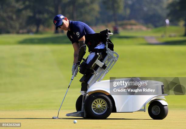 Michael Nicholson of the United States putts on the 10th green in the Men's Golf final during the Invictus Games 2017 at St George's Golf and Country...