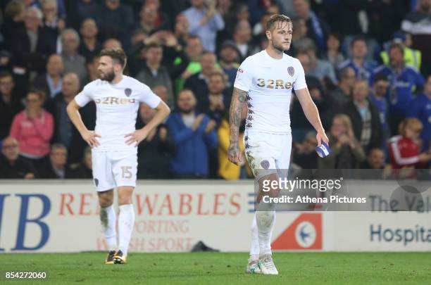 Liam Cooper of Leeds United leaves the field after receiving a red card during the Sky Bet Championship match between Cardiff City and Leeds United...