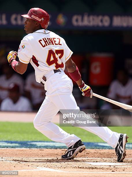 Endy Chavez of Venezuela triples against the Netherlands during round 2 of the World Baseball Classic at Dolphin Stadium on March 14, 2009 in Miami,...