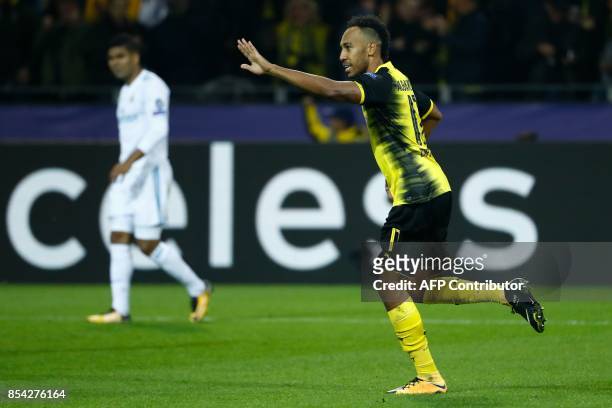 Dortmund's Gabonese forward Pierre-Emerick Aubameyang celebrates scoring during the UEFA Champions League Group H football match BVB Borussia...
