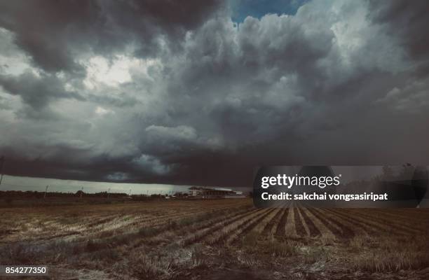 storm over the farm - ominous stock pictures, royalty-free photos & images