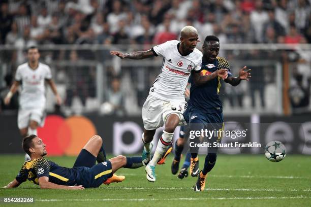 Talisca of Besiktas and Jean-Kevin Augustin of RB Leipzig battle for possession during the UEFA Champions League Group G match between Besiktas and...