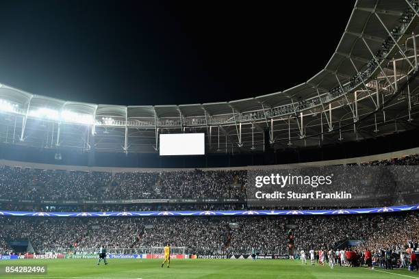 General view inside the stadium as some of the flood lights go out during the UEFA Champions League Group G match between Besiktas and RB Leipzig at...