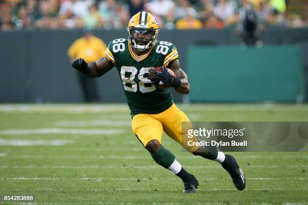 Ty Montgomery of the Green Bay Packers runs with the ball in the fourth quarter against the Cincinnati Bengals at Lambeau Field on September 24, 2017...