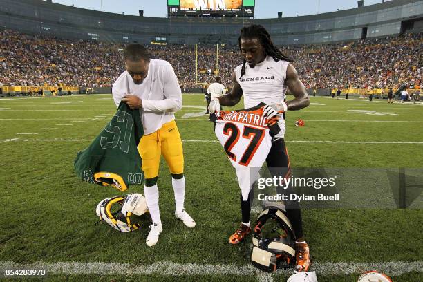 Ha Ha Clinton-Dix of the Green Bay Packers and Dre Kirkpatrick of the Cincinnati Bengals exchange jerseys after the Green Bay Packers beat the...