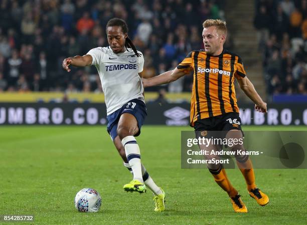 Preston North End's Daniel Johnson competing with Hull City's Sebastian Larsson during the Sky Bet Championship match between Hull City and Preston...