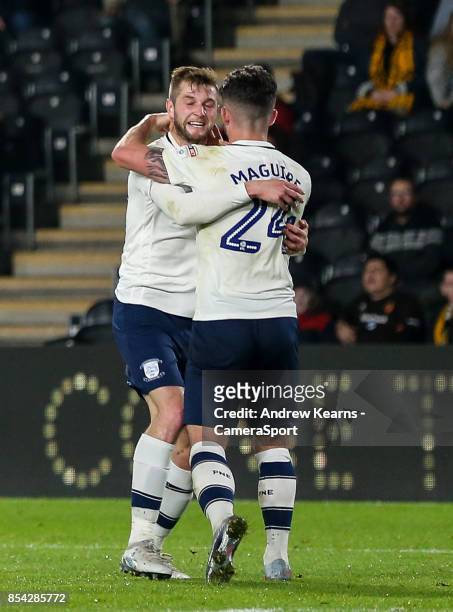 Preston North End's Tom Barkhuizen celebrates scoring his side's first goal with team mate Sean Maguire during the Sky Bet Championship match between...