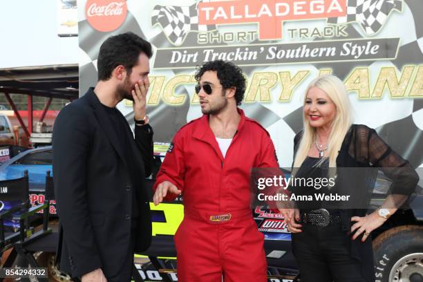 Producers and founders of AMBI Media Group Andrea Iervolino and Monika Bacardi pose with actor Toby Sebastian On The Set Of The Movie "Trading Paint"...