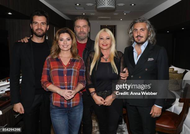 Producer and founder of AMBI Media Group Andrea Iervolino, Shania Twain, John Travolta, producer and founder of AMBI Media Group Monika Bacardi, and...