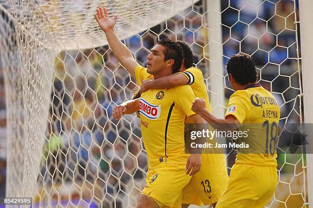America's Salvador Cabanas celebrates with teammates during their match against Cruz Azul in the 2009 Clausura tournament, the closing stage of the...