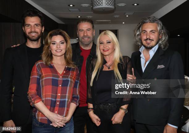 Producer and founder of AMBI Media Group Andrea Iervolino, Shania Twain, John Travolta, producer and founder of AMBI Media Group Monika Bacardi, and...