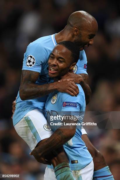 Raheem Sterling of Manchester City celebrates scoring his sides second goal with Fabian Delph of Manchester City during the UEFA Champions League...