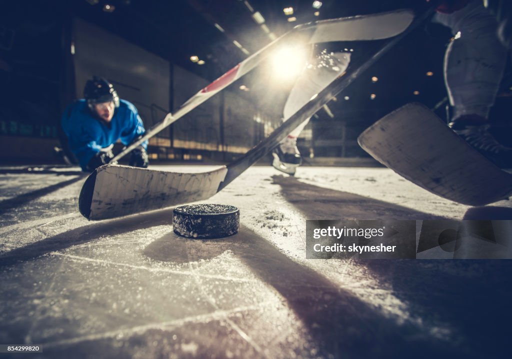 Close up of ice hockey puck during a match.