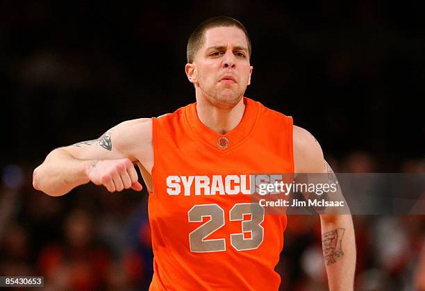 Eric Devendorf of the Syracuse Orange reacts between plays against the Louisville Cardinals during the championship game of the Big East Tournament...