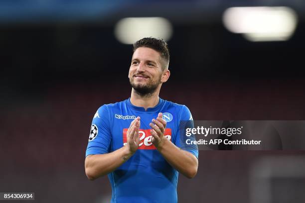 Napoli's forward from Belgium Dries Mertens celebrates at the end of the UEFA Champion's League Group F football match Napoli vs Feyenoord Rotterdam...