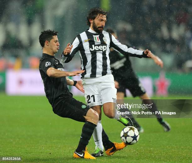 Juventus's Andrea Pirlo and Celtic's Beram Kayal battle for the ball