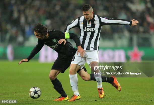 Celtic's Georgios Samaras and Juventus' Luca Marrone battle for the ball