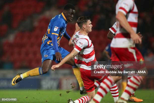 Arthur Gnahoua of Shrewsbury Town scores a goal to make it 1-2 during the Sky Bet League One match between Doncaster Rovers and Shrewsbury Town at...