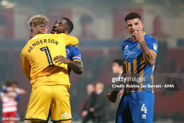 Dean Henderson of Shrewsbury Town, Abu Ogogo of Shrewsbury Town and Ben Godfrey of Shrewsbury Town celebrate at full time during the Sky Bet League...