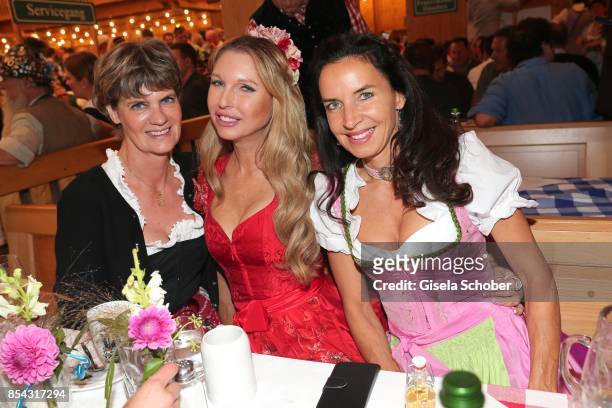 Petra Reinbold, Sabine Piller and Clarissa Kaefer during the Oktoberfest at Schuetzen Festzelt at Theresienwiese on September 26, 2017 in Munich,...