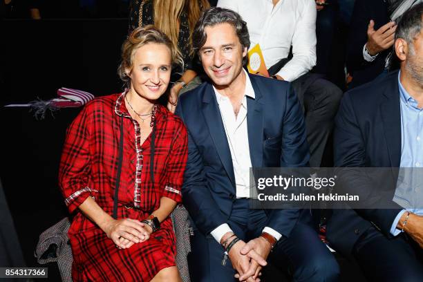 Laurent Solly and wife Caroline Roux attend the Etam show as part of the Paris Fashion Week Womenswear Spring/Summer 2018 on September 26, 2017 in...