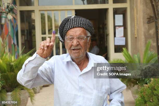 Kurdish man is pictured after casted his vote at the polling station. September 25, 2017 is a historic day for Kurdish people around the world as...